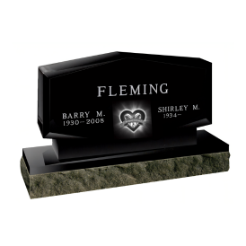 Double headstone with top that comes to a point at the top and beveled bottom with Forever in love text with rings engraving